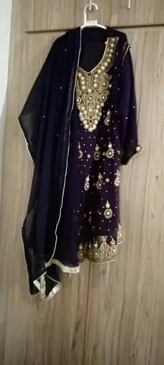 Heavy embroidered purple party wear dress