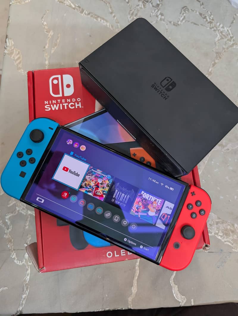 Nintendo Switch OLED + Pro Controller + 2 Games + Pouch | Full Bundle 1