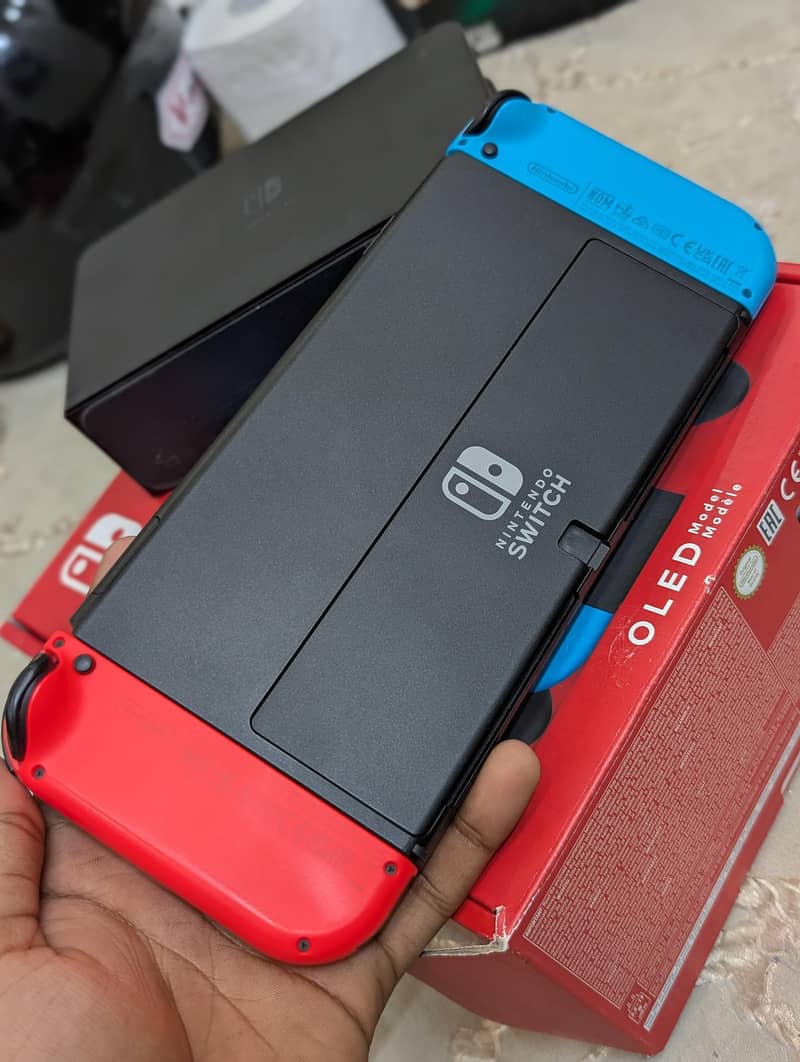 Nintendo Switch OLED + Pro Controller + 2 Games + Pouch | Full Bundle 3