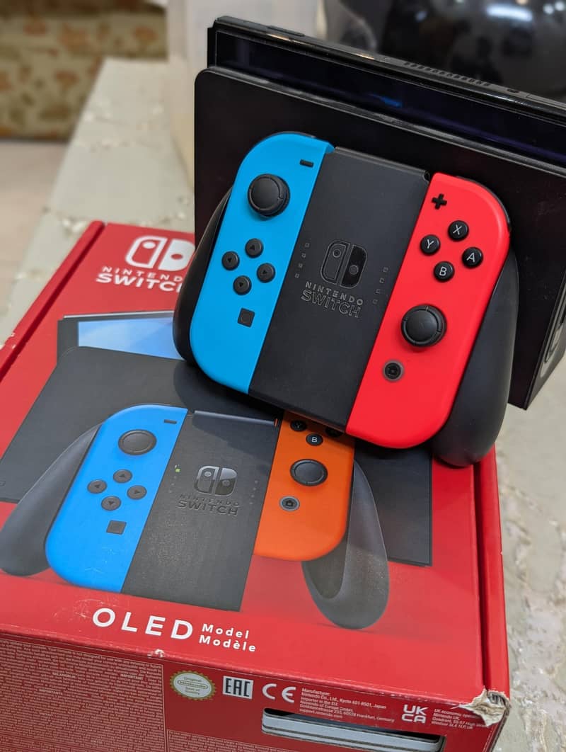 Nintendo Switch OLED + Pro Controller + 2 Games + Pouch | Full Bundle 7