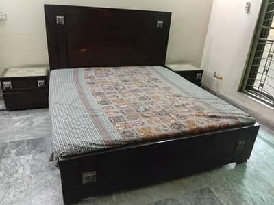 bed with side tables