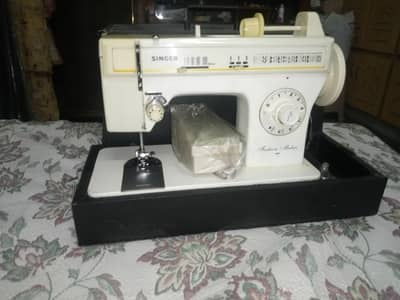 Singer sewing machine plus embroidery