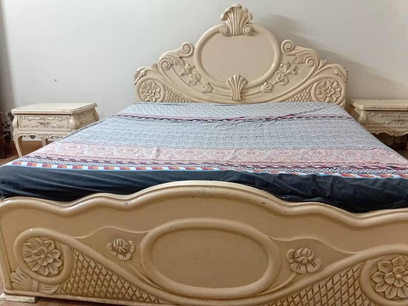 bed with side tables and dressing table 0