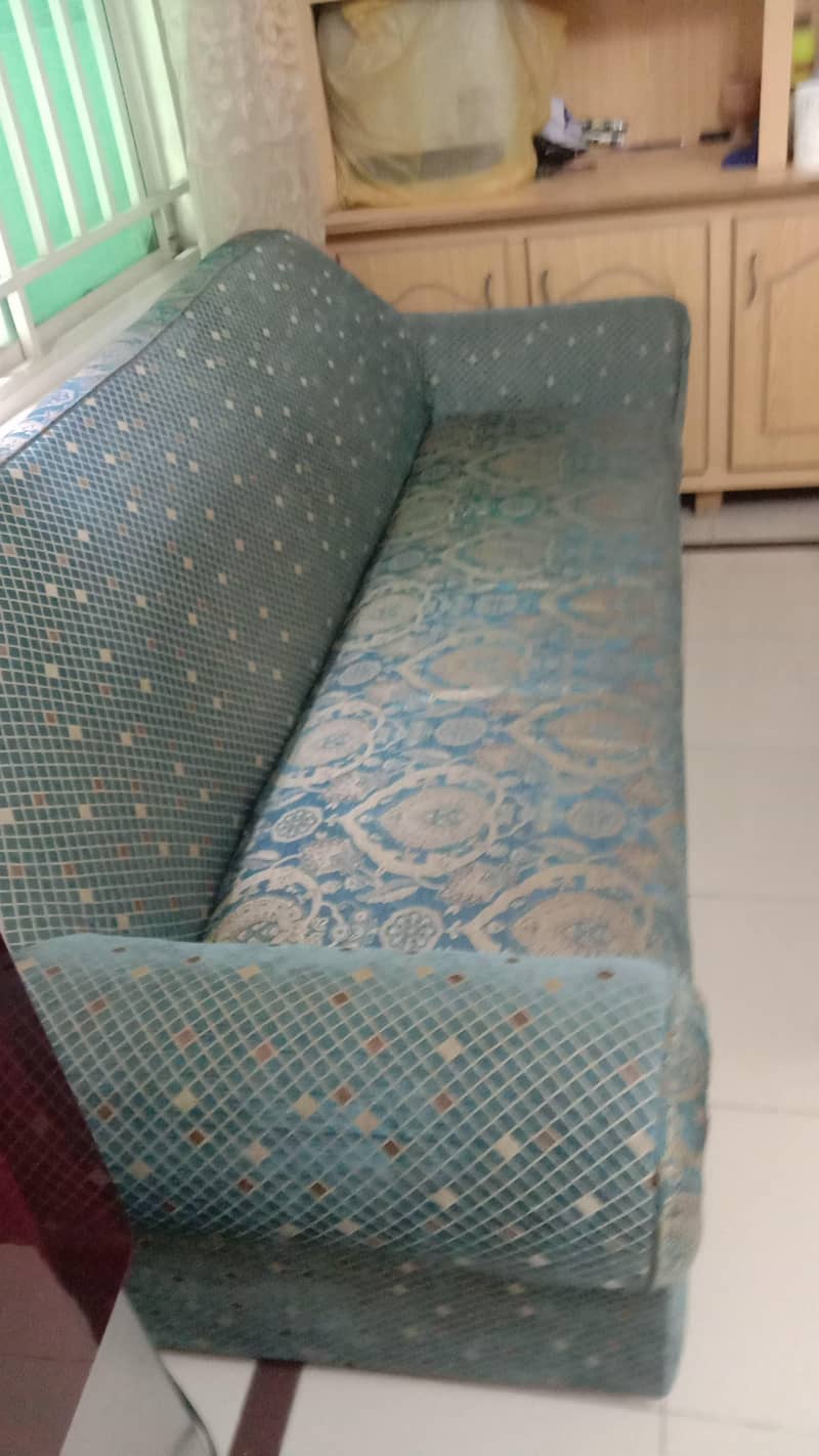 5 seater 2 sofas with a single bed 4