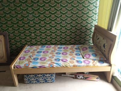 single wooden bed