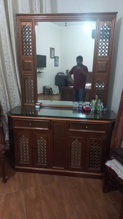 Wooden bed with dressing table