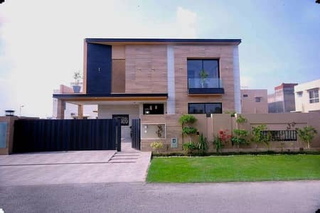1 KANAL ELEGANT & SUPER HOT LOCATED BUNGALOW WITH BASEMENT IS AVAILABLE IN THE BEST BLOCK OF DHA LAHORE.