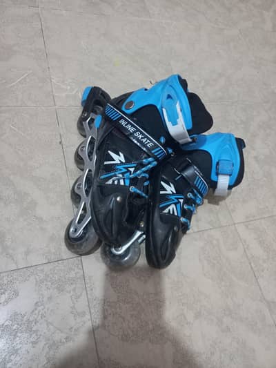 Blue & Black Inline Skates / Roller Skates – Good Condition”