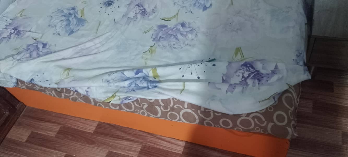 bed and side table 0