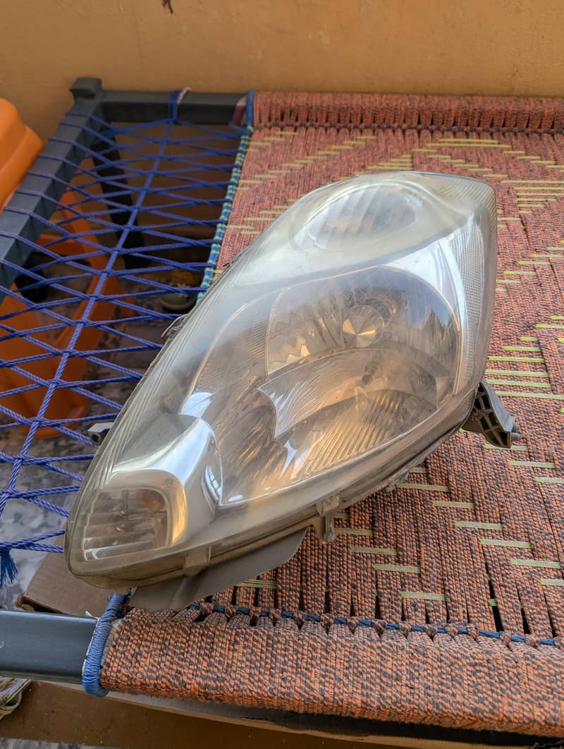 Passo 2007 left headlight 0