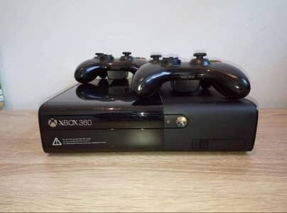 Xbox 360 slim with 2 original controllers