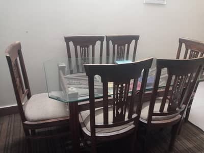 Dining table set comprising of 6 chairs for sale in reasonable price.