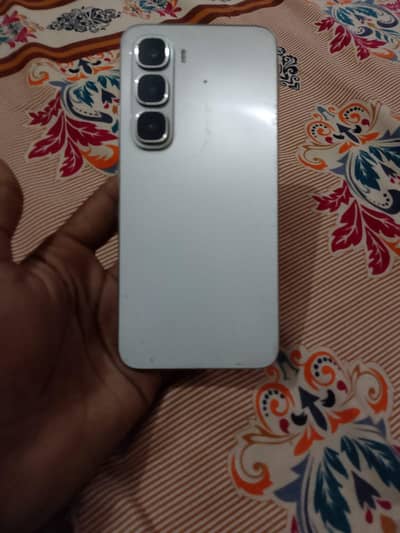 Infinix Hot 60i.   10.9 total German box. charger