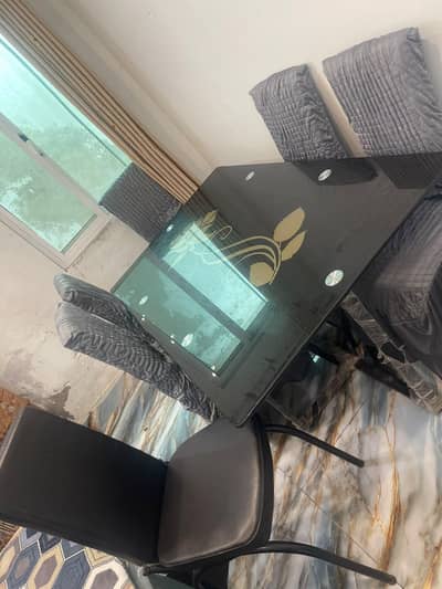 chairs and Dining table for sale out