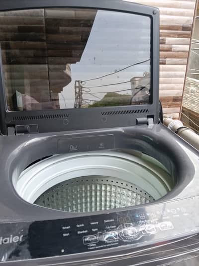 Haier one touch fully automatic machine 15 kg