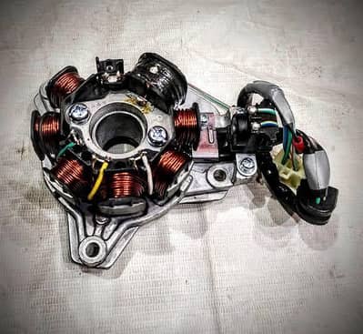 Honda 125 magnet coil complete