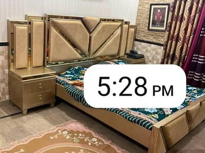 Bed with side table and dressing table
