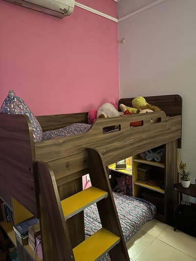 Interwood bunk bed with mattress.