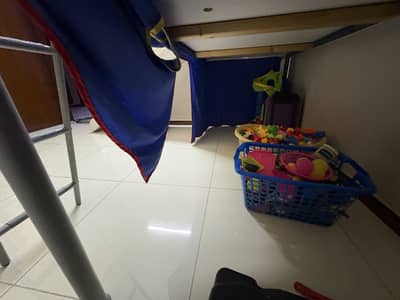 Bed with slide