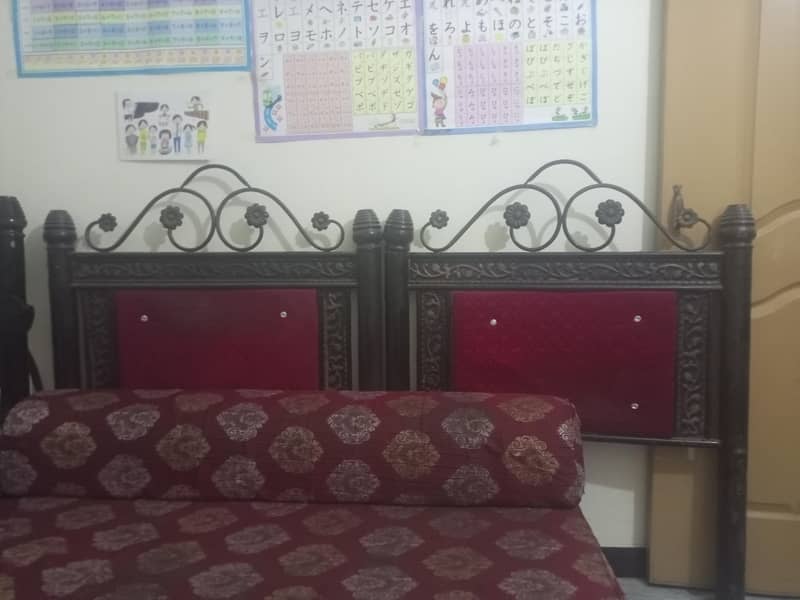 iron single bed pair 1