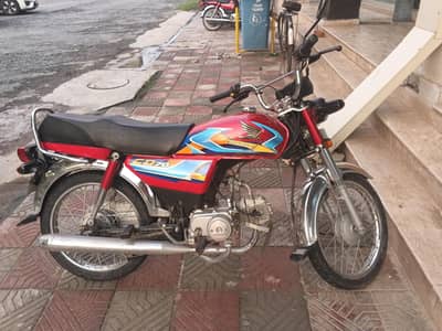 Honda Red Bike hai 2026 Modal