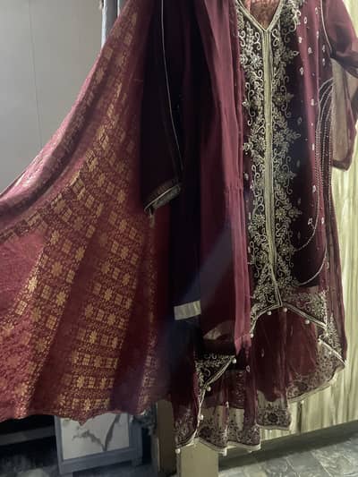 Fancy maroon chiffon formal dress with heavy embroiderey