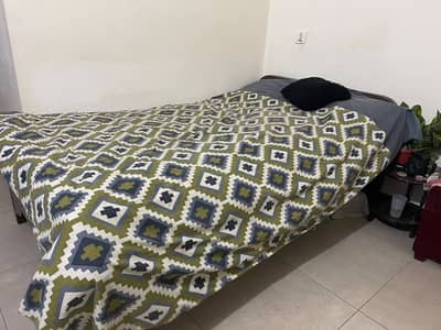 Wooden single bed