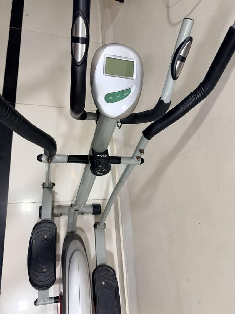 Cross trainer exercise machine 2