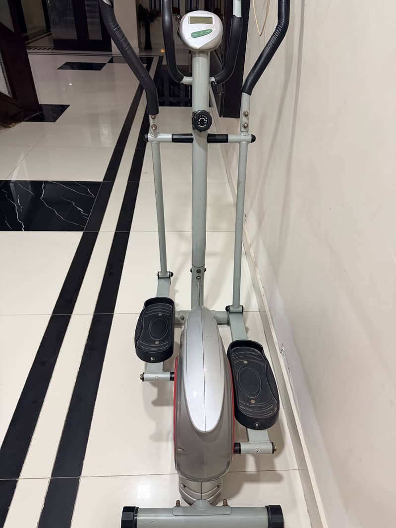 Cross trainer exercise machine 4