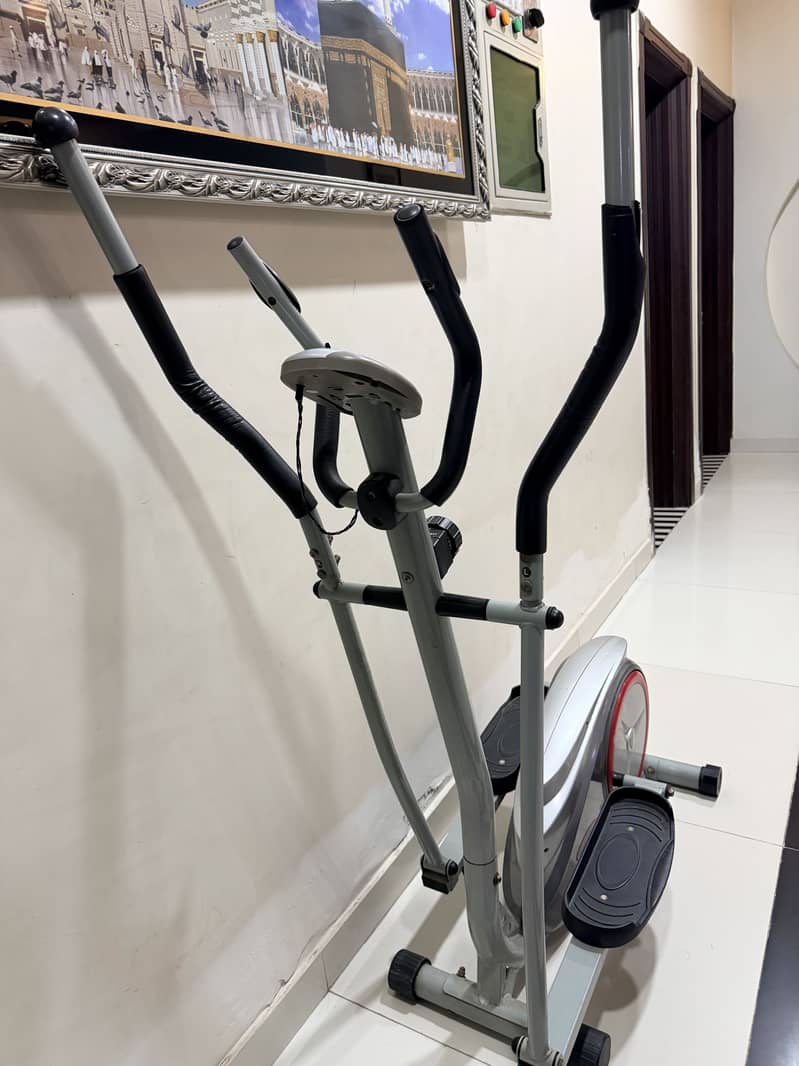 Cross trainer exercise machine 5