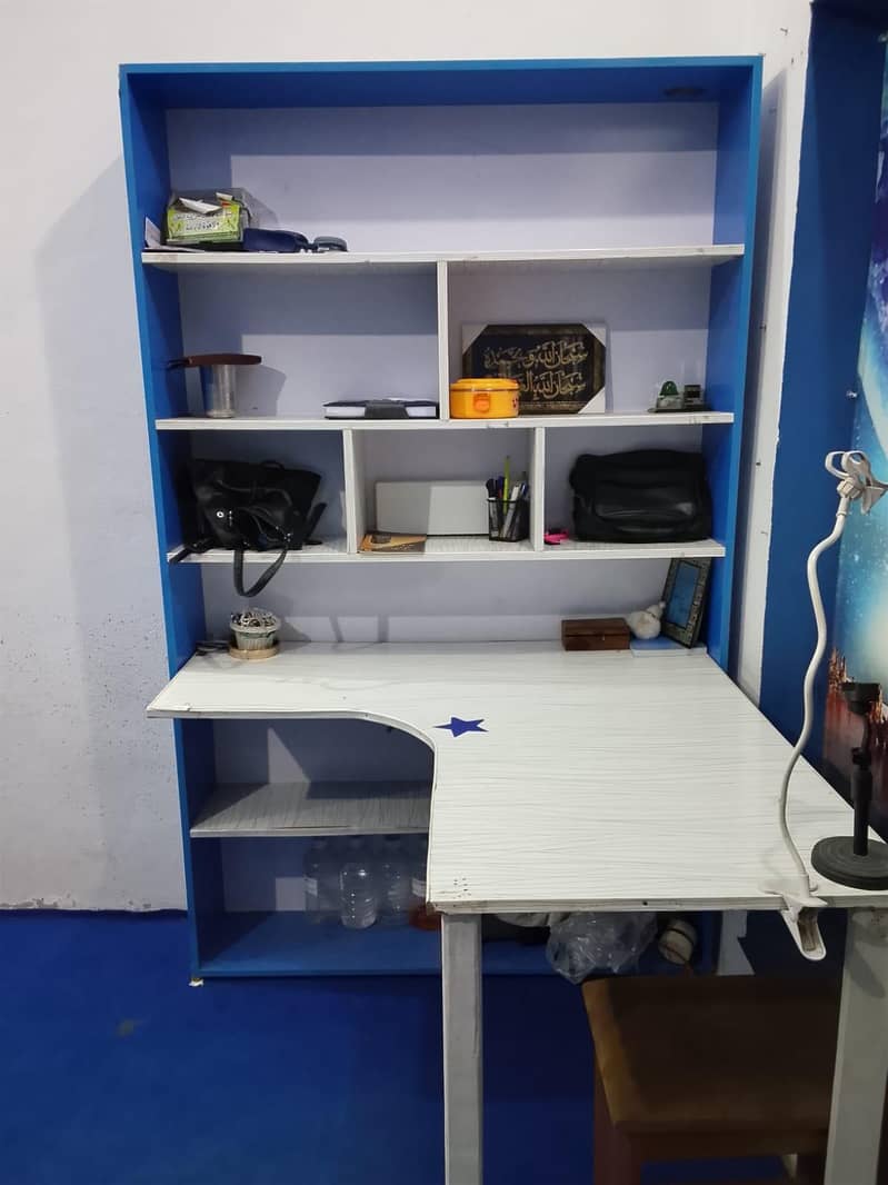 Study table with book selves 1