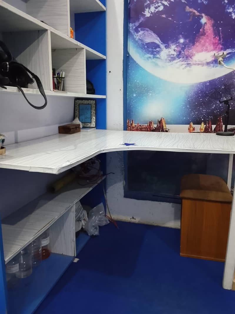 Study table with book selves 3