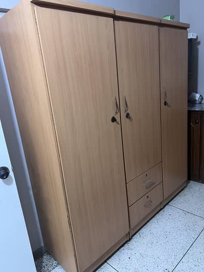 Three doors wardrobe
