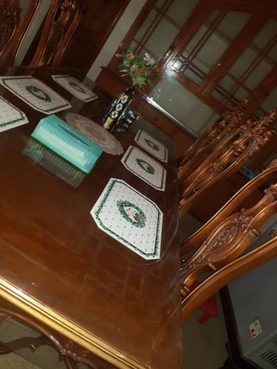 Executive dining table made from TALI with 8 chairs