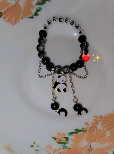 pure. crystal breslet with a beautiful panda charm and double chain