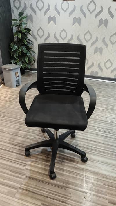 Revolving office chair