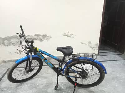 ALMOST NEW MOUNTAIN BIKE WITH GEARS AND DISC BREAK