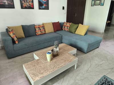 L-Shaped sofa with centre table