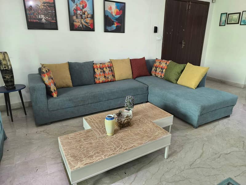 L-Shaped sofa with centre table 1