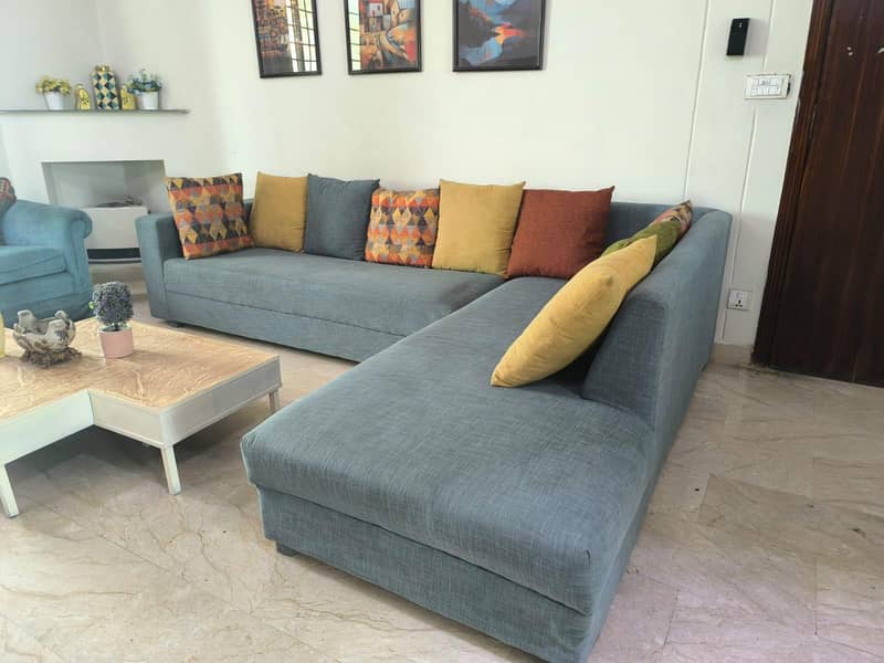 L-Shaped sofa with centre table 3