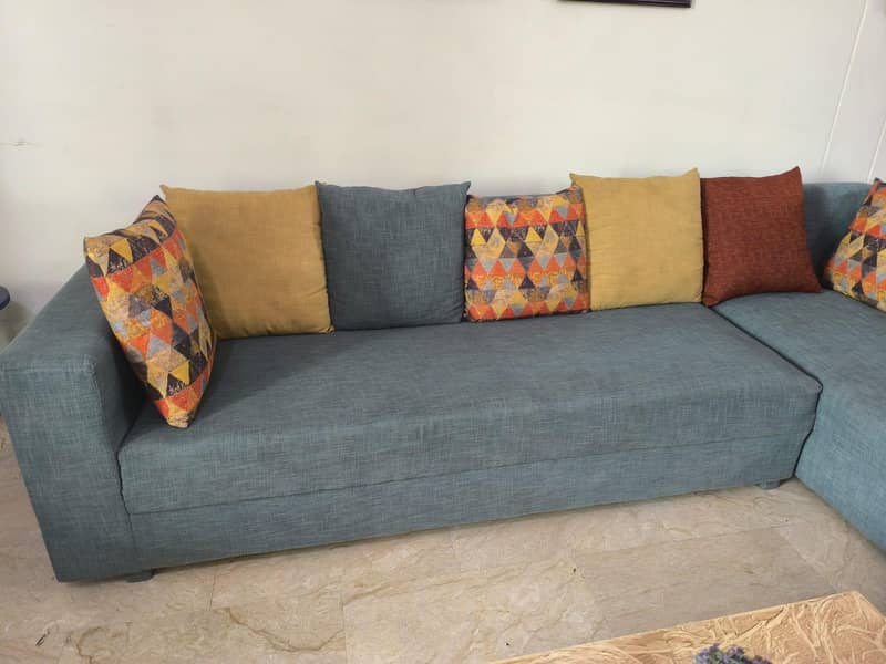 L-Shaped sofa with centre table 4