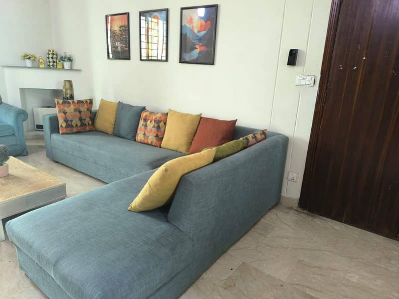 L-Shaped sofa with centre table 5