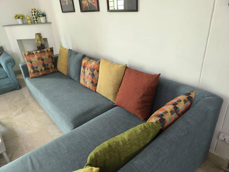 L-Shaped sofa with centre table 7