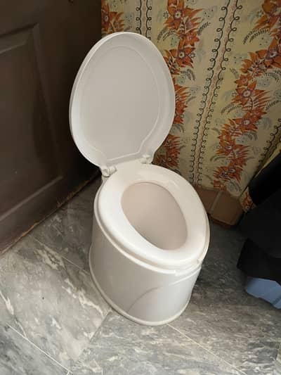 Plastic Commode seat like new condition