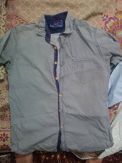 5 Shirts for sale , size small and medium condition like almost new