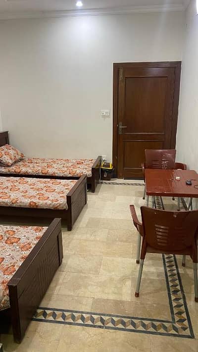 ZA Boys Hostel/Living space/Accomodation/Room in E11