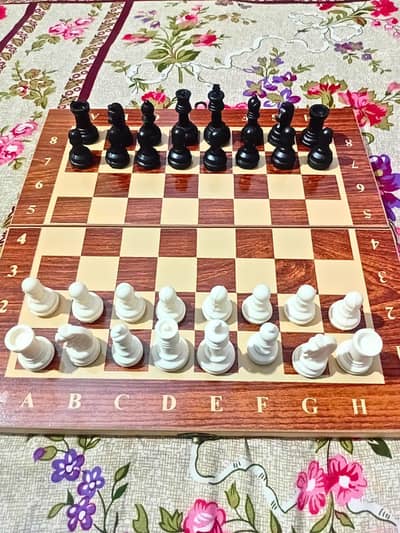 New wooden chees board with hard plastic piceces