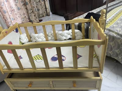 baby swing coat wooden