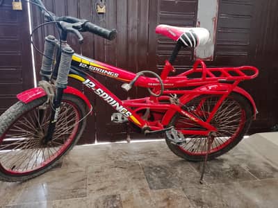 Red color bicycle for sale , condition 10/10