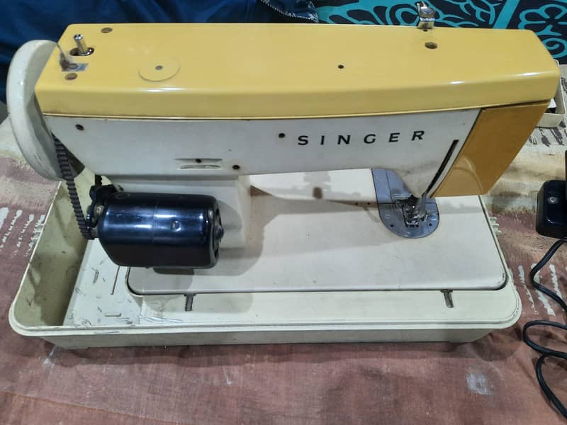 singer deluxe machine 2
